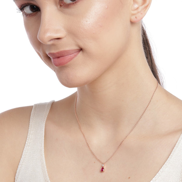 Woman wearing a rose gold plated 925 Sterling Silver necklace with ruby tear drop pendant for women – Zavya