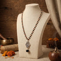 Rudraksha Karungali Malai in Silver-Cap with Om Shiva Trishul with Larger Bead