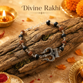 Rudraksha Karungali Bracelet with silver-capped Trishool Damroo charm