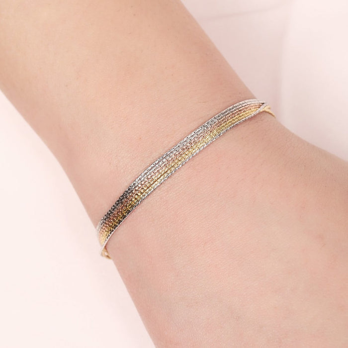 Triple tone 7 chain 925 Sterling Silver bracelet on a woman's wrist. Silver jewellery for women – Zavya
