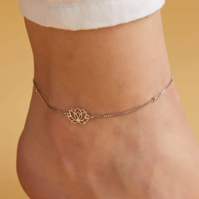 Woman wearing a delicate lotus 925 Sterling Silver anklet. Minimalist everyday jewellery for women – Zavya