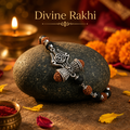 Silver Capped Karungali Rudraksha Bracelet with OM Trishul Damroo charm