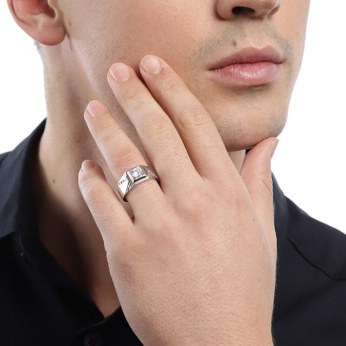Man wearing a CZ studded 925 Sterling Silver ring. A perfect mens jewelry gift for him. – Zavya
