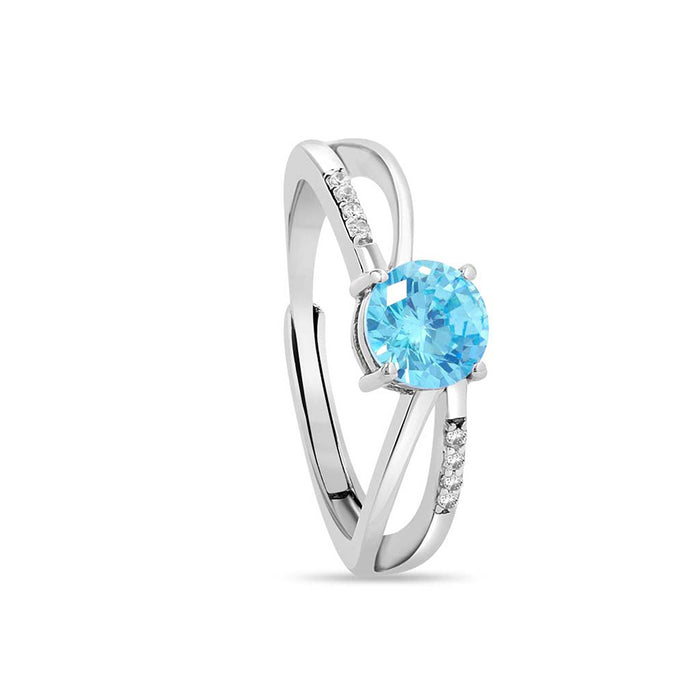 Women's 925 Sterling Silver adjustable crossover ring with a round blue CZ stone – Zavya