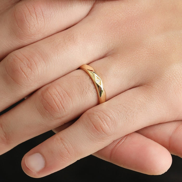 Gold plated 925 Sterling Silver ring with a subtle stone, worn on a man's hand. Perfect gift for him – Zavya