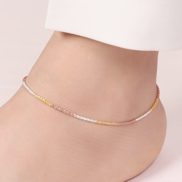 Triple tone weave 925 Sterling Silver anklet on a woman's ankle. Delicate women's jewelry. – Zavya