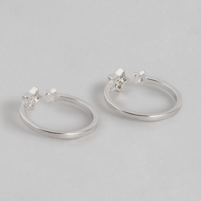 Two adjustable 925 Sterling Silver toe rings for women, featuring open star designs. – Zavya