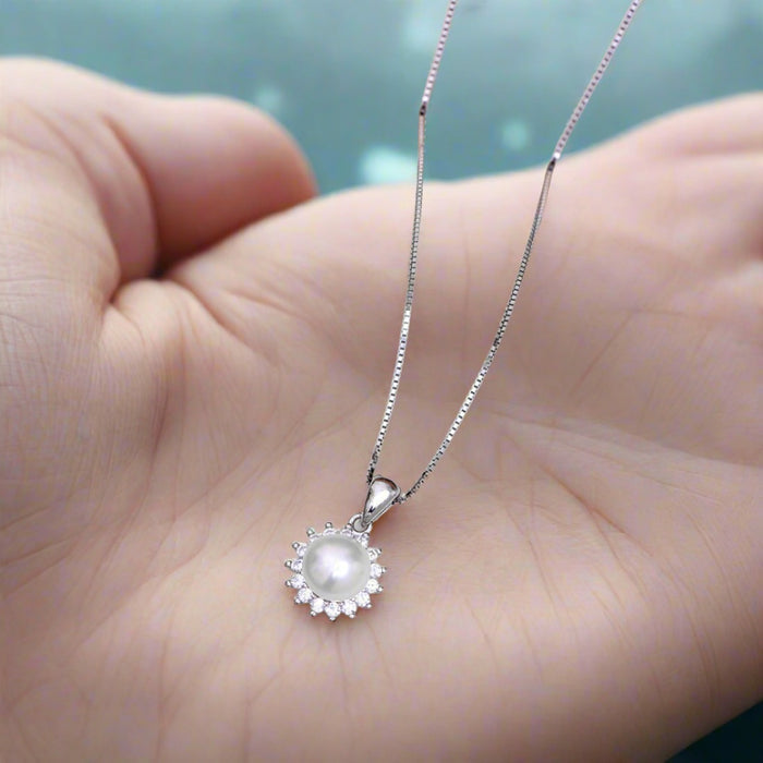 Twinkling Grace: Cubic Zirconia Rhodium Plated 925 Sterling Silver Pendent with Chain