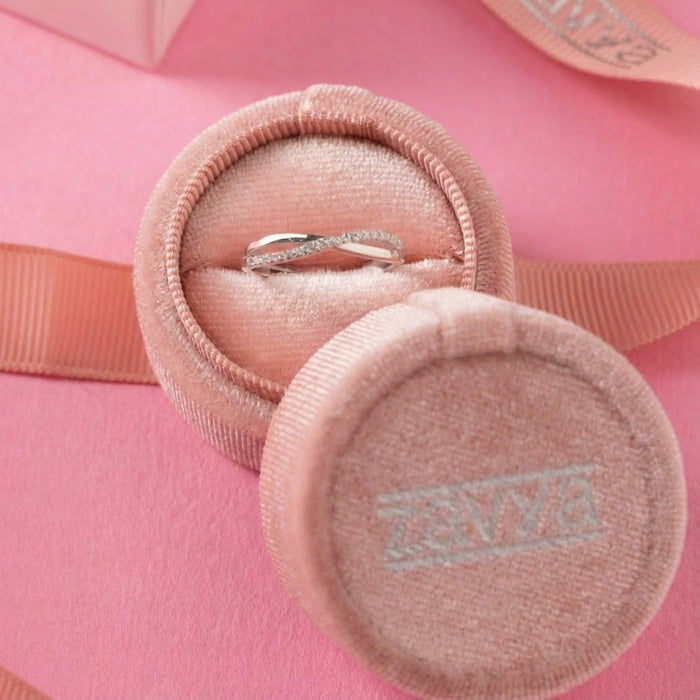 925 Sterling Silver adjustable sparkle ring for women inside a pink velvet box. Elegant silver jewelry – Zavya