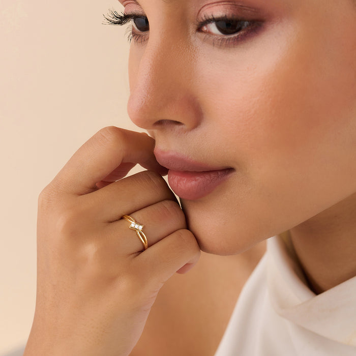 Woman wearing a 925 Sterling Silver gold plated adjustable infinity ring on her finger – Zavya