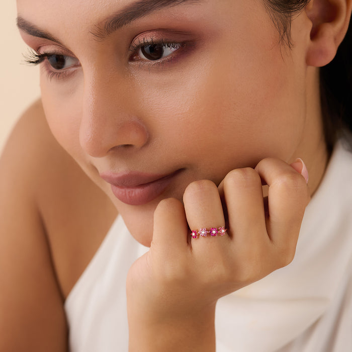Woman wearing a rose gold plated 925 sterling silver pink floral ring for women – Zavya
